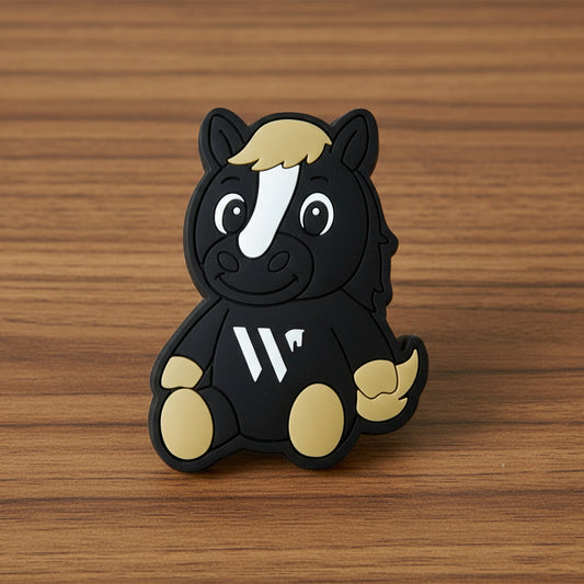 Black and brown horse mascot with a white stripe on a wooden background