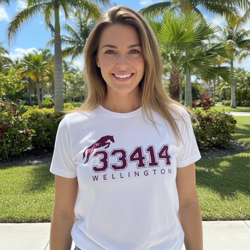 woman wearing a white tshirt with purple numbers
