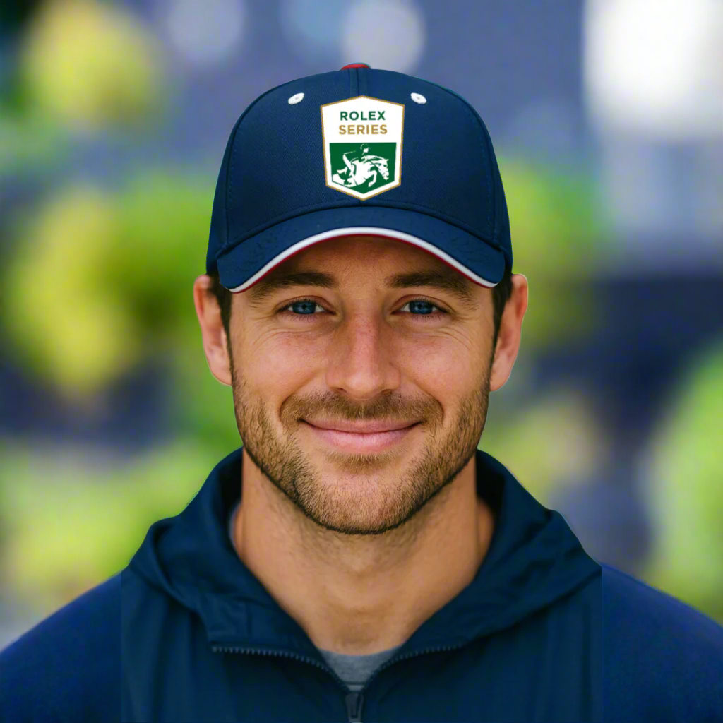 Man wearing a navy blue cap with Rolex Series equestrian logo outside