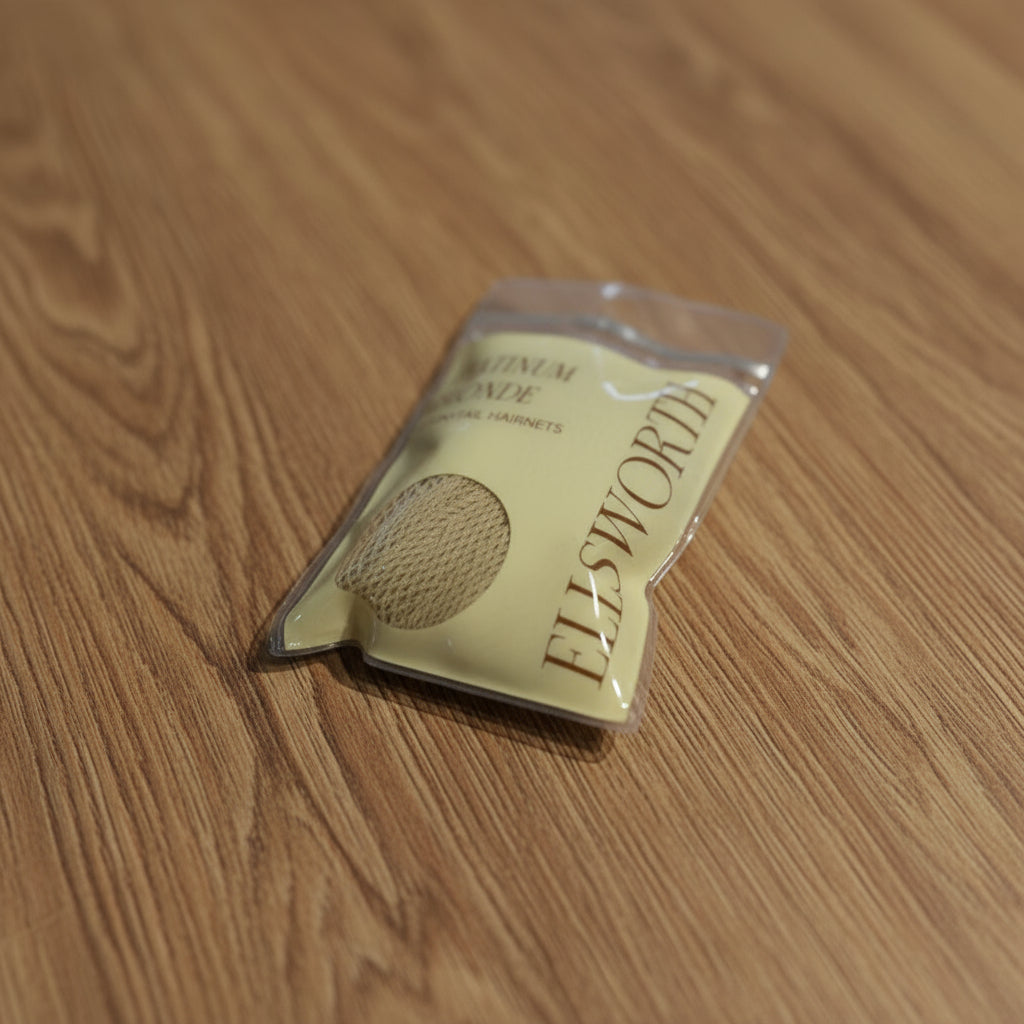 Ellsworth hairnet in a clear container on a wooden table