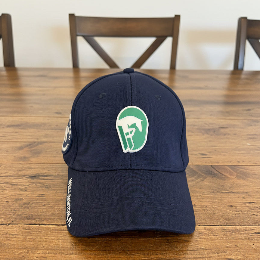 navy blue WEF branded had sitting on a table