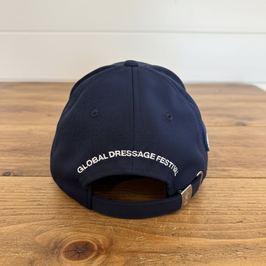 back view of navy blue gdf hat sitting on table