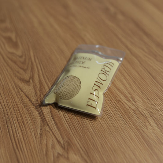 Ellsworth hairnet in a clear container on a wooden table