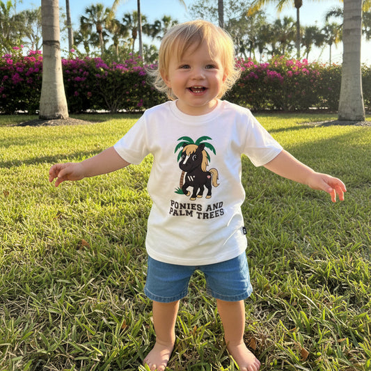 child wearing ponies and palm trees tshirt