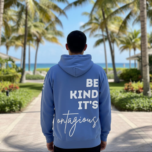 man wearing tmk be kind sweatshirt 