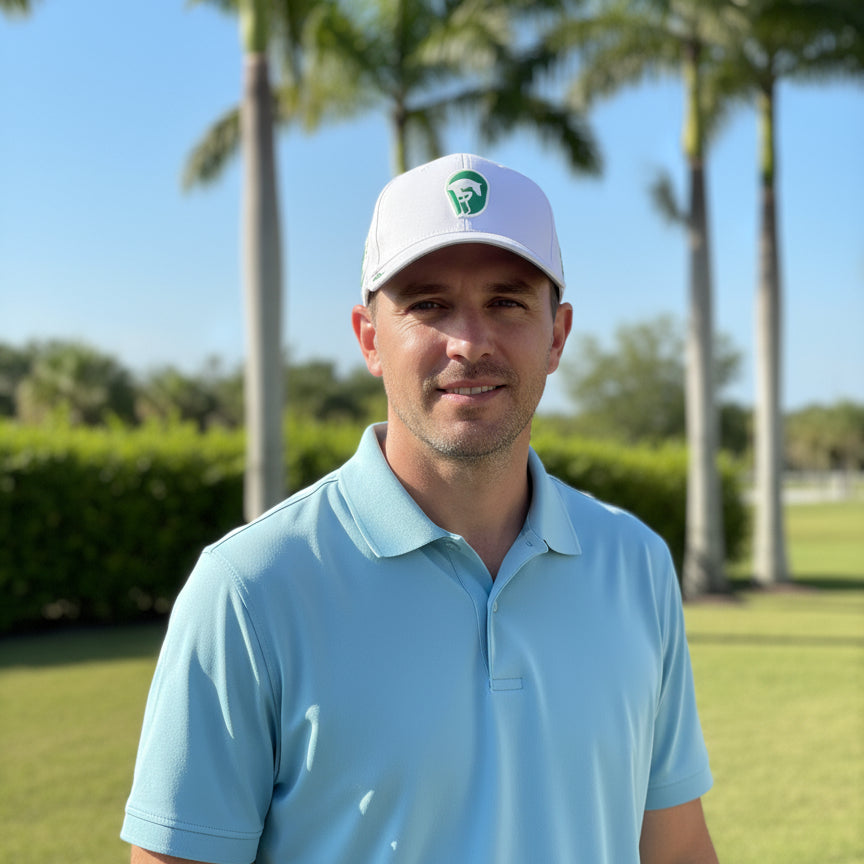 white hat on a man with WEF logo outside